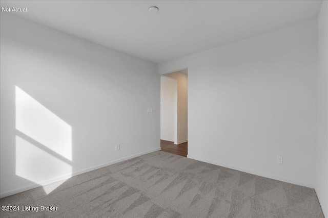 empty room with carpet floors