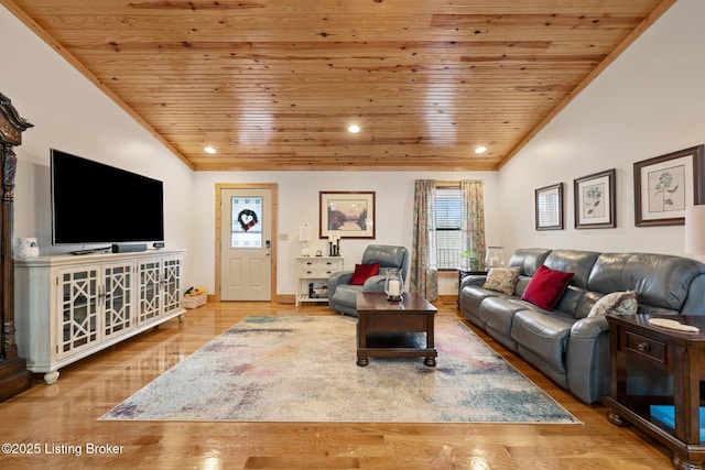 living room featuring lofted ceiling, wooden ceiling, wood finished floors, and crown molding