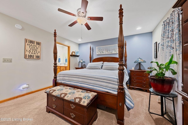 carpeted bedroom with connected bathroom, baseboards, a ceiling fan, and recessed lighting