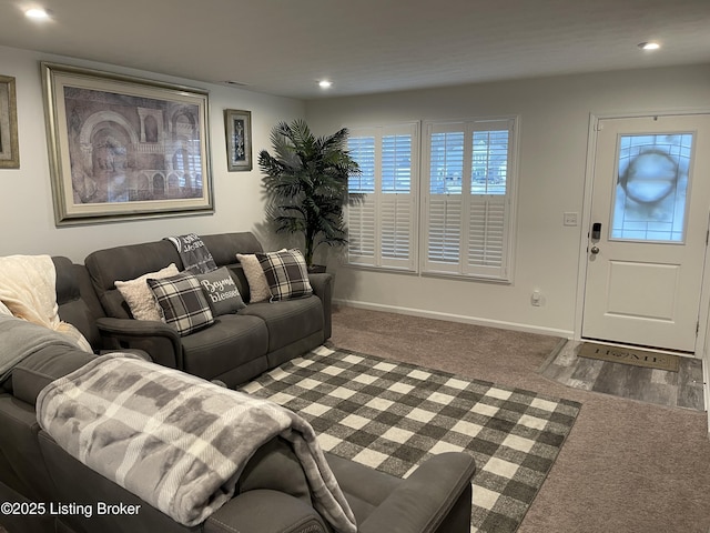 living area featuring carpet floors, recessed lighting, and baseboards