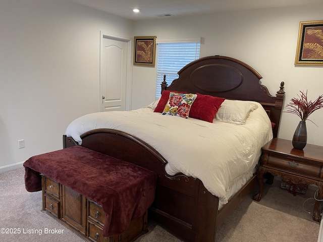 carpeted bedroom with baseboards, visible vents, and recessed lighting