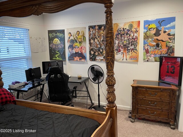 carpeted bedroom with baseboards