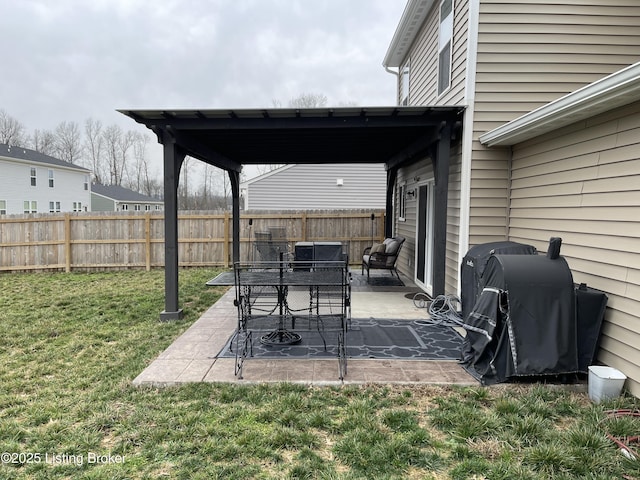 view of patio featuring grilling area and a fenced backyard