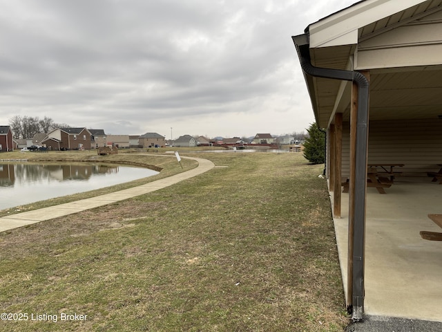 view of yard with a water view