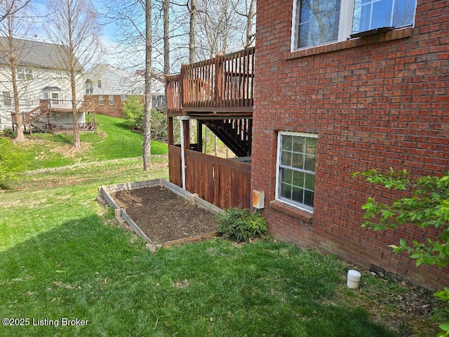 view of yard with a wooden deck