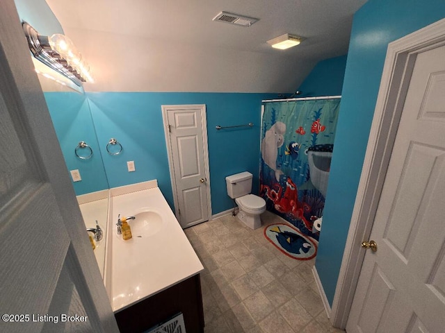 full bathroom with visible vents, toilet, a shower with curtain, lofted ceiling, and vanity