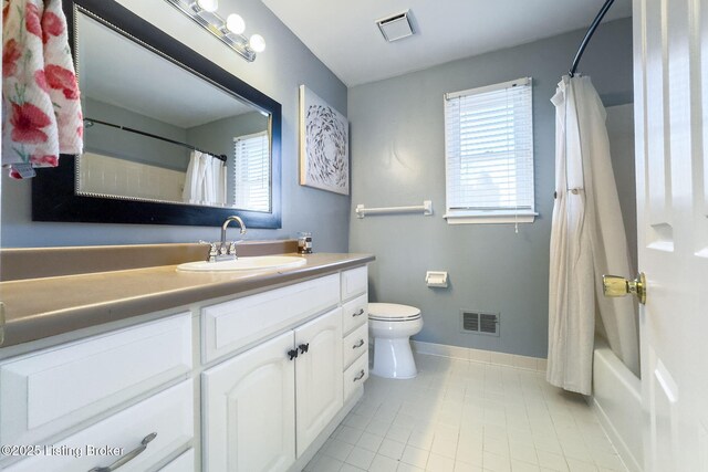 full bathroom featuring toilet, tile patterned flooring, visible vents, and vanity