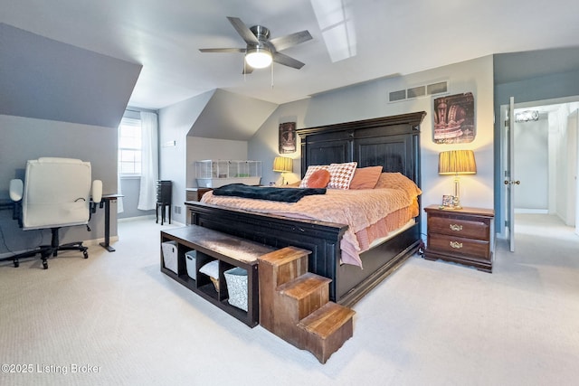 bedroom featuring light carpet, vaulted ceiling, visible vents, and baseboards