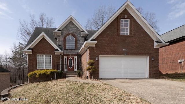 traditional-style home with an attached garage, brick siding, concrete driveway, stone siding, and roof with shingles