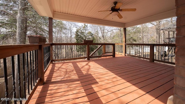 wooden deck with ceiling fan