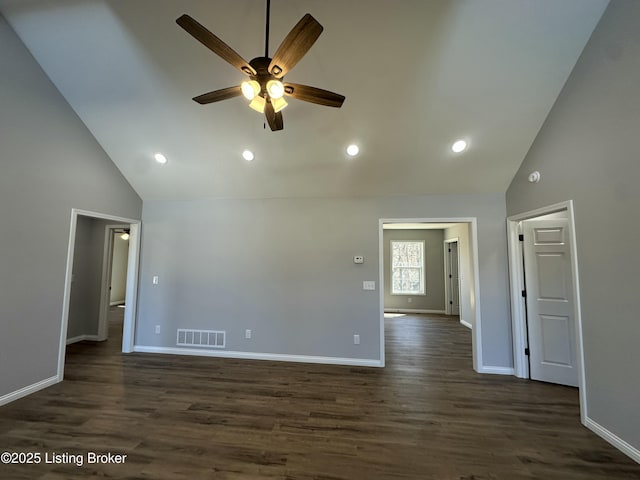 spare room featuring visible vents, baseboards, dark wood-style flooring, and a ceiling fan