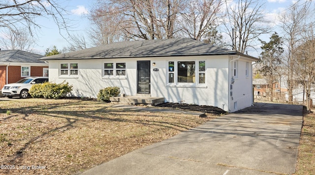 view of front of house featuring brick siding