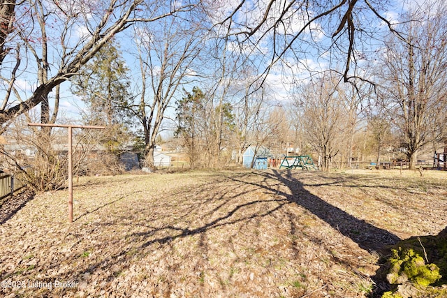 view of yard featuring fence