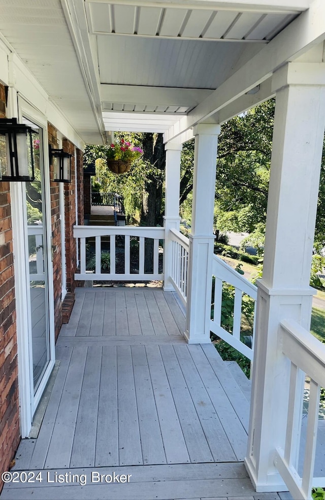 wooden deck featuring a porch