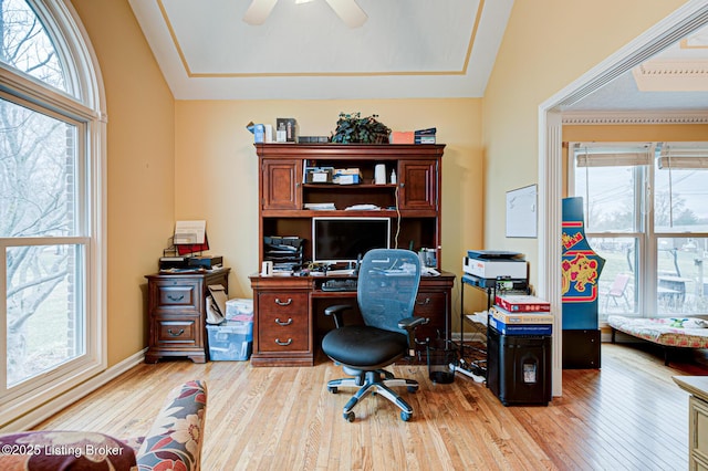 office area with a ceiling fan and wood finished floors