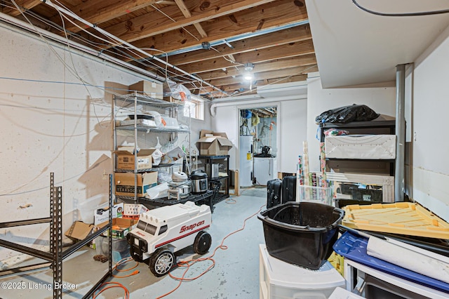 below grade area featuring water heater