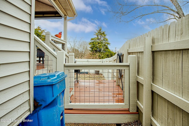 view of gate featuring fence