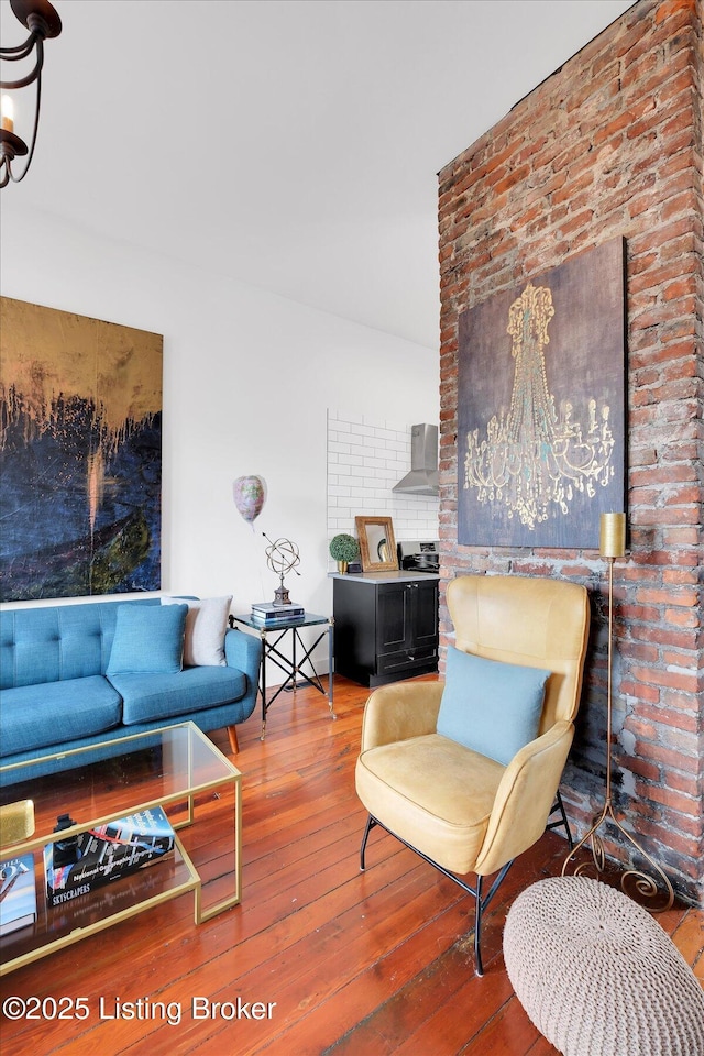 living area with hardwood / wood-style flooring