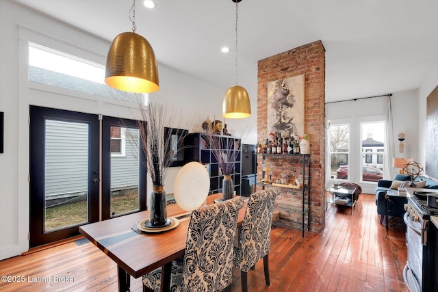 dining space featuring hardwood / wood-style flooring