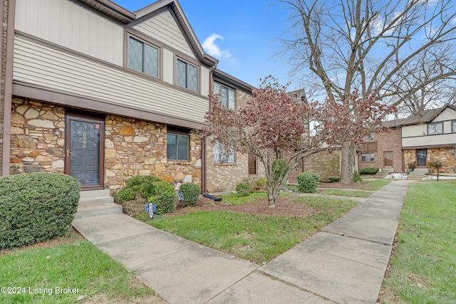 view of front of property with stone siding