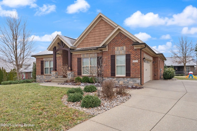 craftsman-style home featuring concrete driveway, stone siding, an attached garage, a front lawn, and brick siding