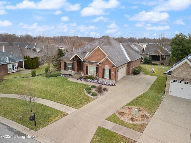 craftsman-style house featuring driveway, a shingled roof, an attached garage, a front lawn, and brick siding