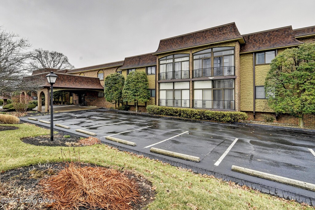 1602 Gardiner Ln Unit 131, Louisville, KY 40205 - exterior space with uncovered parking