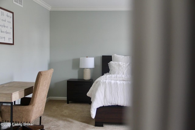 bedroom with baseboards, carpet, visible vents, and crown molding