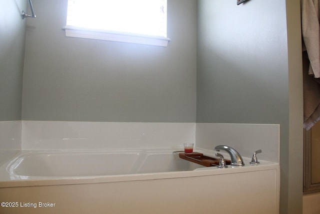 full bath featuring a garden tub