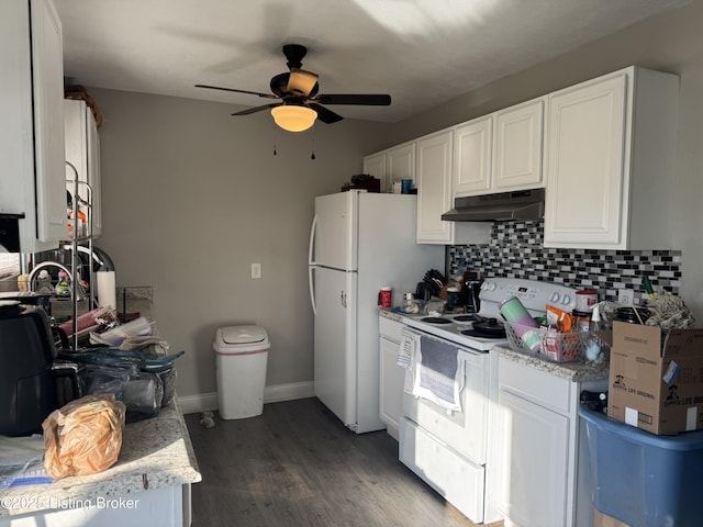 kitchen featuring white appliances, under cabinet range hood, white cabinetry, and decorative backsplash