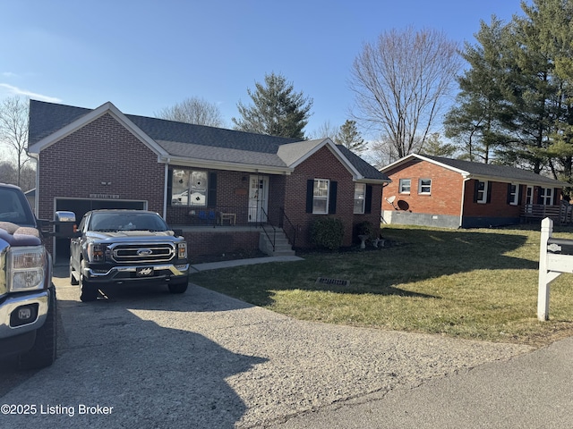 ranch-style house with a garage, a shingled roof, concrete driveway, a front lawn, and brick siding