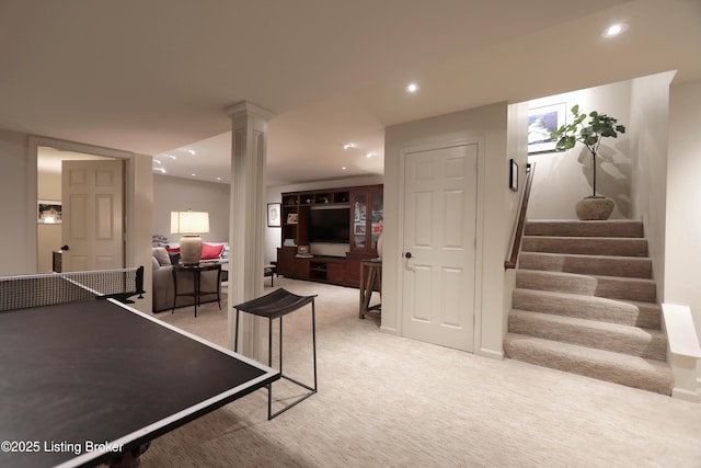 game room featuring light carpet, recessed lighting, and decorative columns