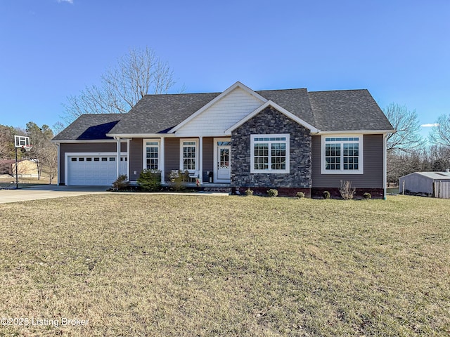 view of front facade featuring an attached garage, driveway, roof with shingles, and a front yard