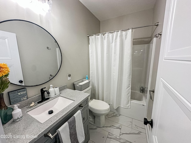 bathroom with toilet, marble finish floor, shower / tub combo with curtain, and vanity