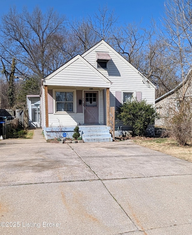 bungalow-style house featuring driveway