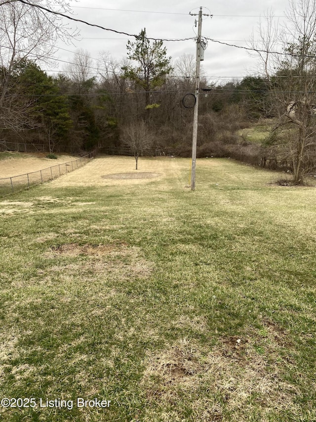 view of yard featuring fence