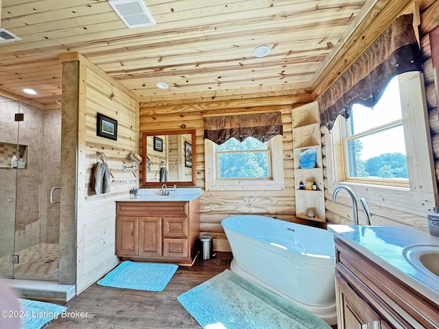 bathroom with wooden ceiling, two vanities, and a shower stall