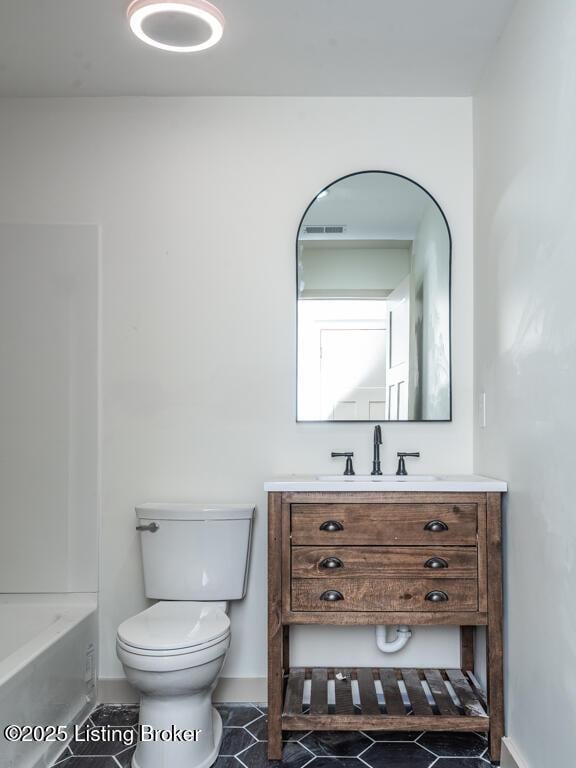 full bath with visible vents, toilet, a bathing tub, tile patterned floors, and vanity