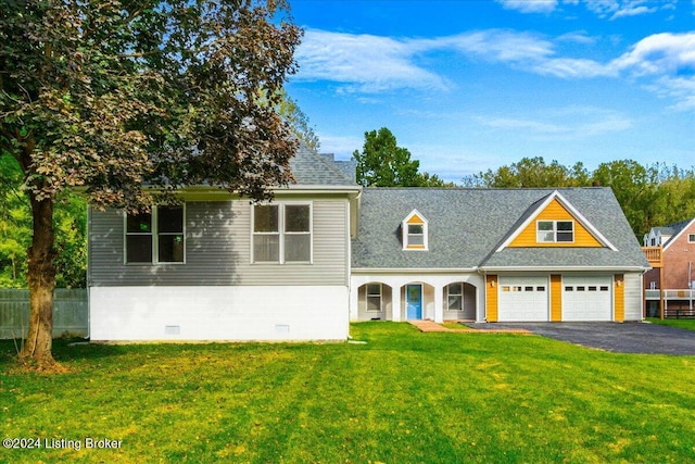 view of front of house with driveway, a shingled roof, crawl space, fence, and a front lawn