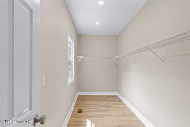 spacious closet with visible vents and light wood finished floors