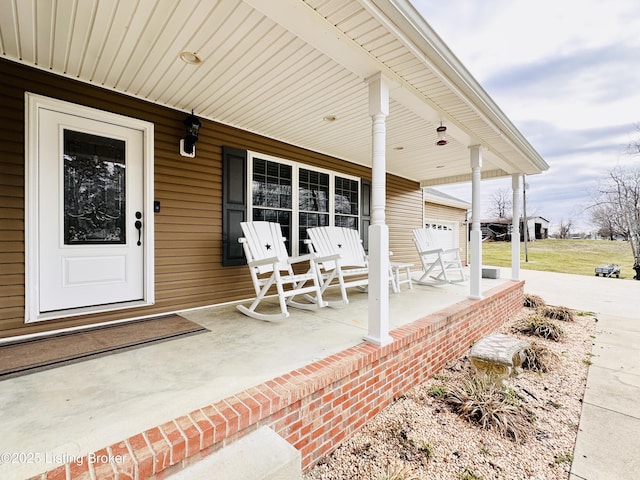 view of patio featuring a porch