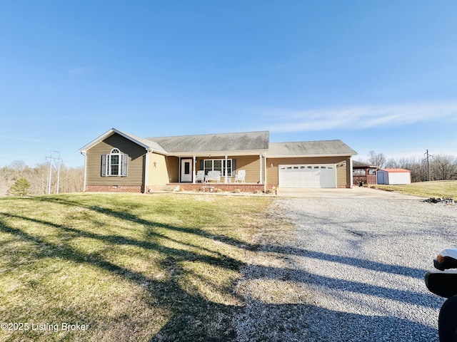 view of front of property with a garage, a porch, concrete driveway, a front yard, and crawl space