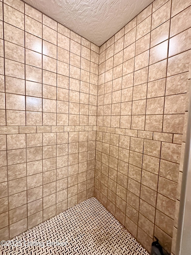 bathroom featuring a textured ceiling