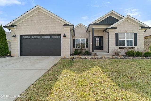 view of front of property featuring driveway, an attached garage, a front lawn, board and batten siding, and brick siding