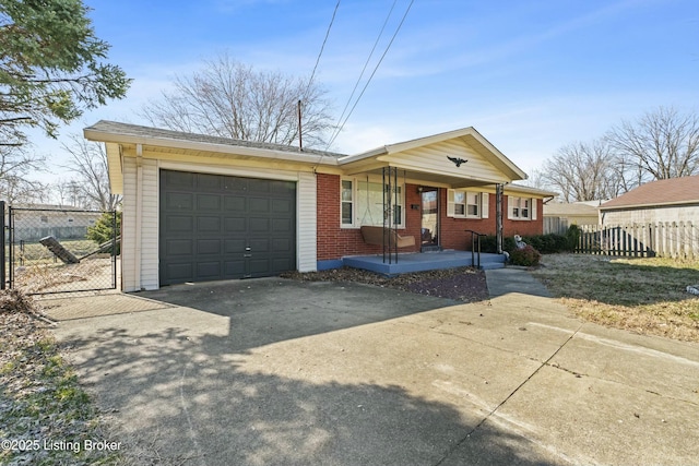 ranch-style home with covered porch, a garage, brick siding, fence, and driveway