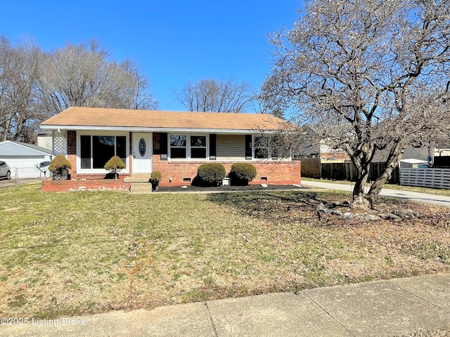 ranch-style house with crawl space, fence, a front lawn, and brick siding