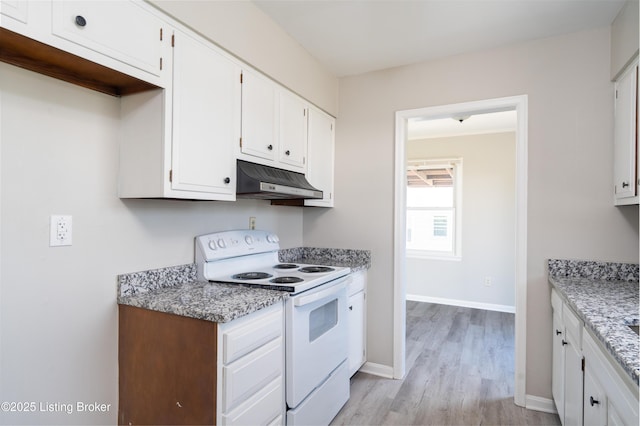 kitchen with under cabinet range hood, electric range, baseboards, white cabinets, and light wood finished floors