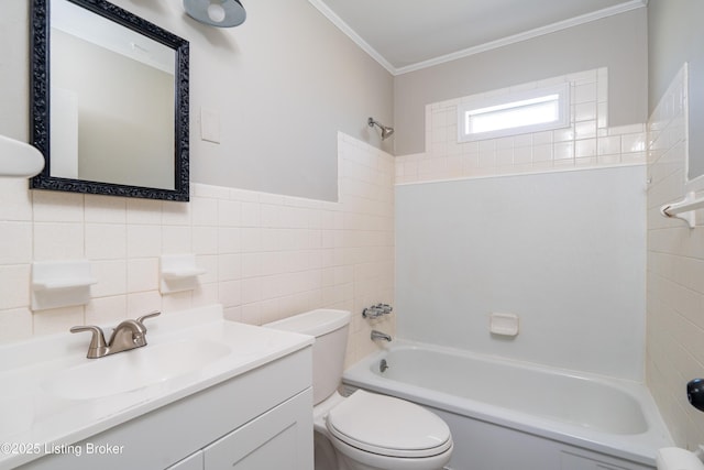 bathroom featuring shower / bathtub combination, toilet, vanity, tile walls, and crown molding