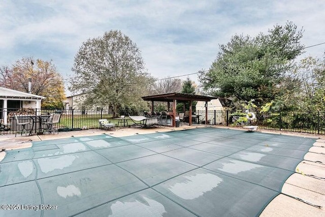 view of pool with fence, a fenced in pool, and a patio