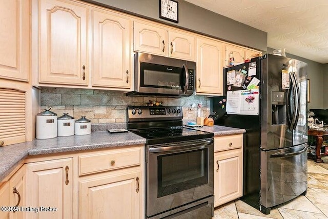 kitchen with range with electric stovetop, fridge with ice dispenser, decorative backsplash, light brown cabinetry, and stainless steel microwave